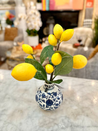Lemons in Ceramic Vase